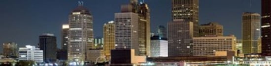 Buildings in a city lit up at night Detroit River Detroit Michigan USA Canvas Art - Panoramic Images (40 x 10)