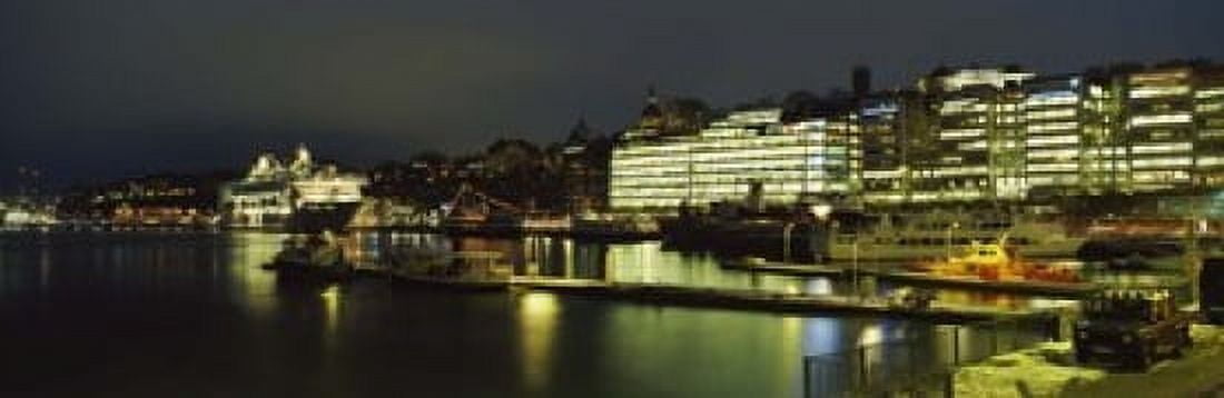 Buildings in a city lit up at night Sodermalm Slussplan Stockholm Sweden Canvas Art - Panoramic Images (18 x 6)
