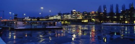 Buildings in a city lit up at night Sodermalm Slussplan Stockholm Sweden Canvas Art - Panoramic Images (36 x 12)