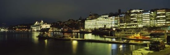 Buildings in a city lit up at night Sodermalm Slussplan Stockholm Sweden Canvas Art - Panoramic Images (36 x 12)