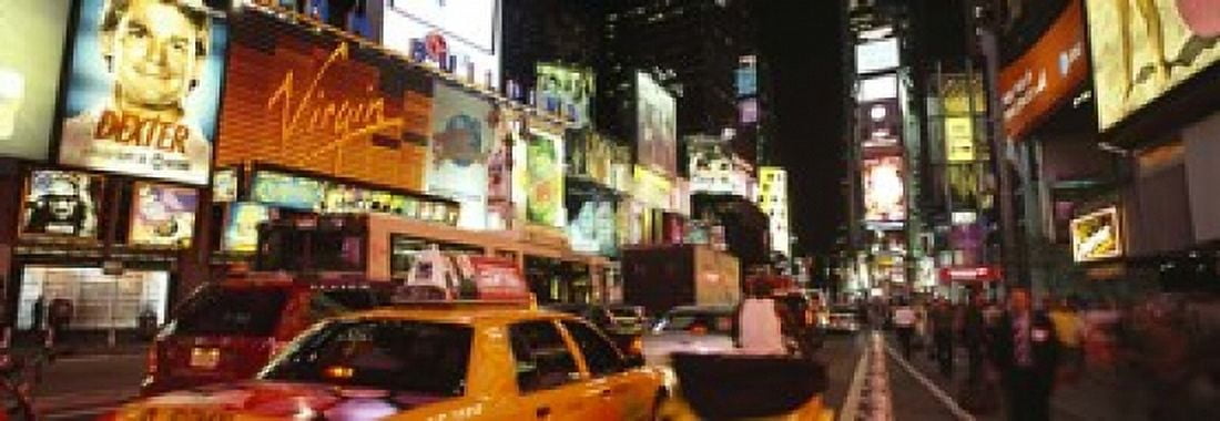 Buildings lit up at night in a city Broadway Times Square Midtown Manhattan Manhattan New York City New York State USA Canvas Art - Panoramic Images (18 x 7)