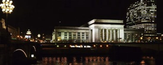 Buildings lit up at night at a railroad station 30th Street Station Schuylkill River Philadelphia Pennsylvania USA Canvas Art - Panoramic Images (30 x 12)