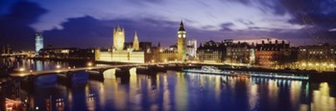 Buildings lit up at dusk Big Ben Houses Of Parliament London England Canvas Art - Panoramic Images (18 x 6)