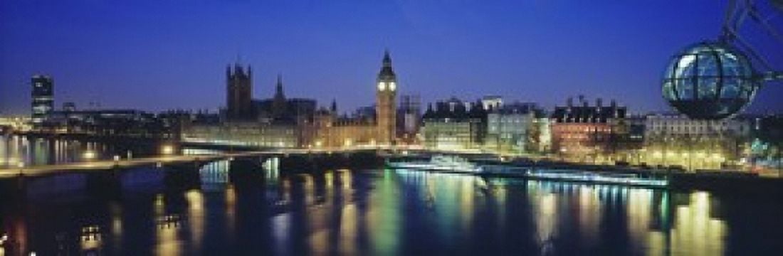 Buildings lit up at dusk Big Ben Houses Of Parliament Thames River London England Canvas Art - Panoramic Images (18 x 6)