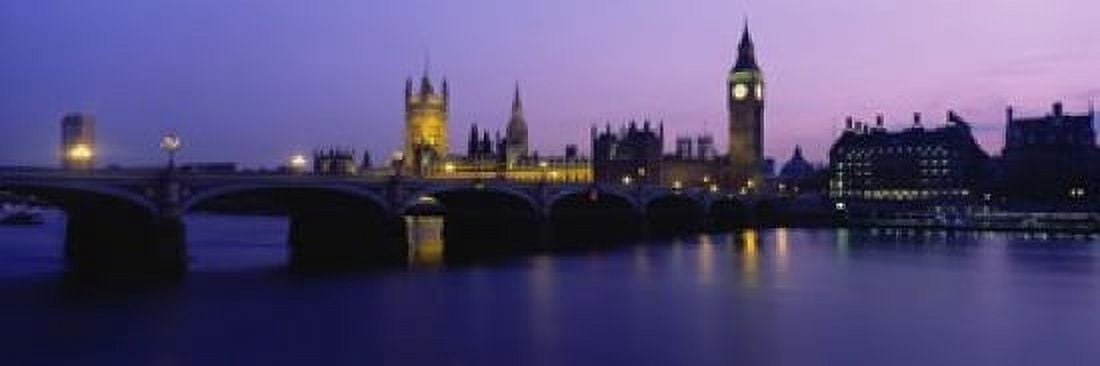Buildings lit up at dusk Big Ben Houses of Parliament London England Canvas Art - Panoramic Images (18 x 6)