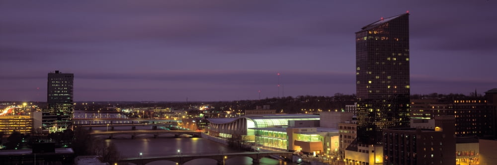 Buildings lit up at dusk Grand Rapids Kent County Michigan USA Canvas Art - Panoramic Images (27 x 9)