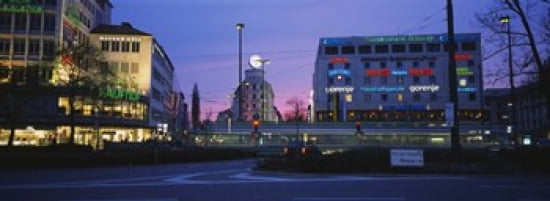 Buildings lit up at dusk Karlsplatz Munich Bavaria Germany Canvas Art - Panoramic Images (36 x 13)