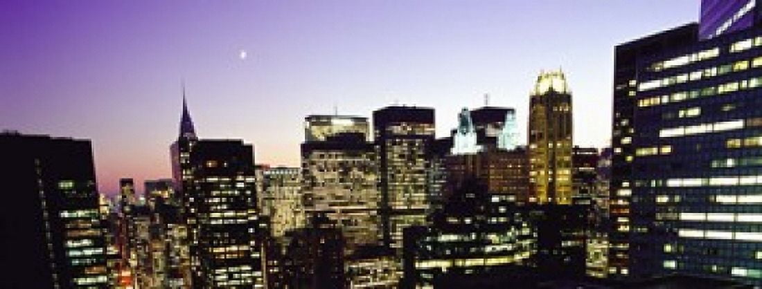 Buildings lit up at dusk Manhattan New York City New York State USA Canvas Art - Panoramic Images (15 x 6)