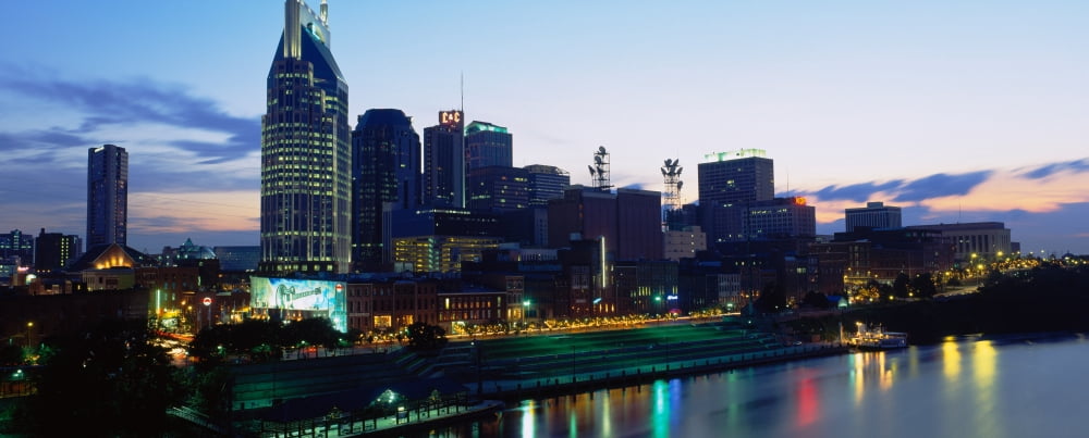 Buildings lit up at dusk Nashville Tennessee USA Canvas Art - Panoramic Images (27 x 9)