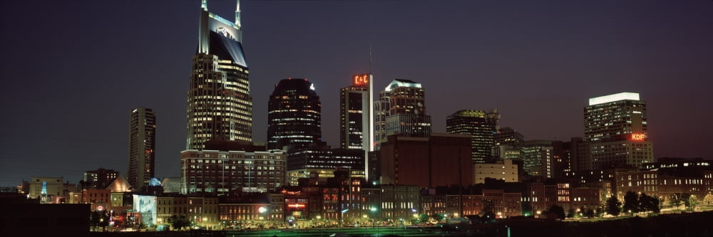 Buildings lit up at dusk Nashville Tennessee USA Canvas Art - Panoramic Images (36 x 12)
