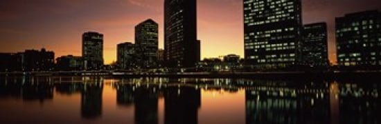 Buildings lit up at dusk Oakland Alameda County California USA Canvas Art - Panoramic Images (36 x 12)