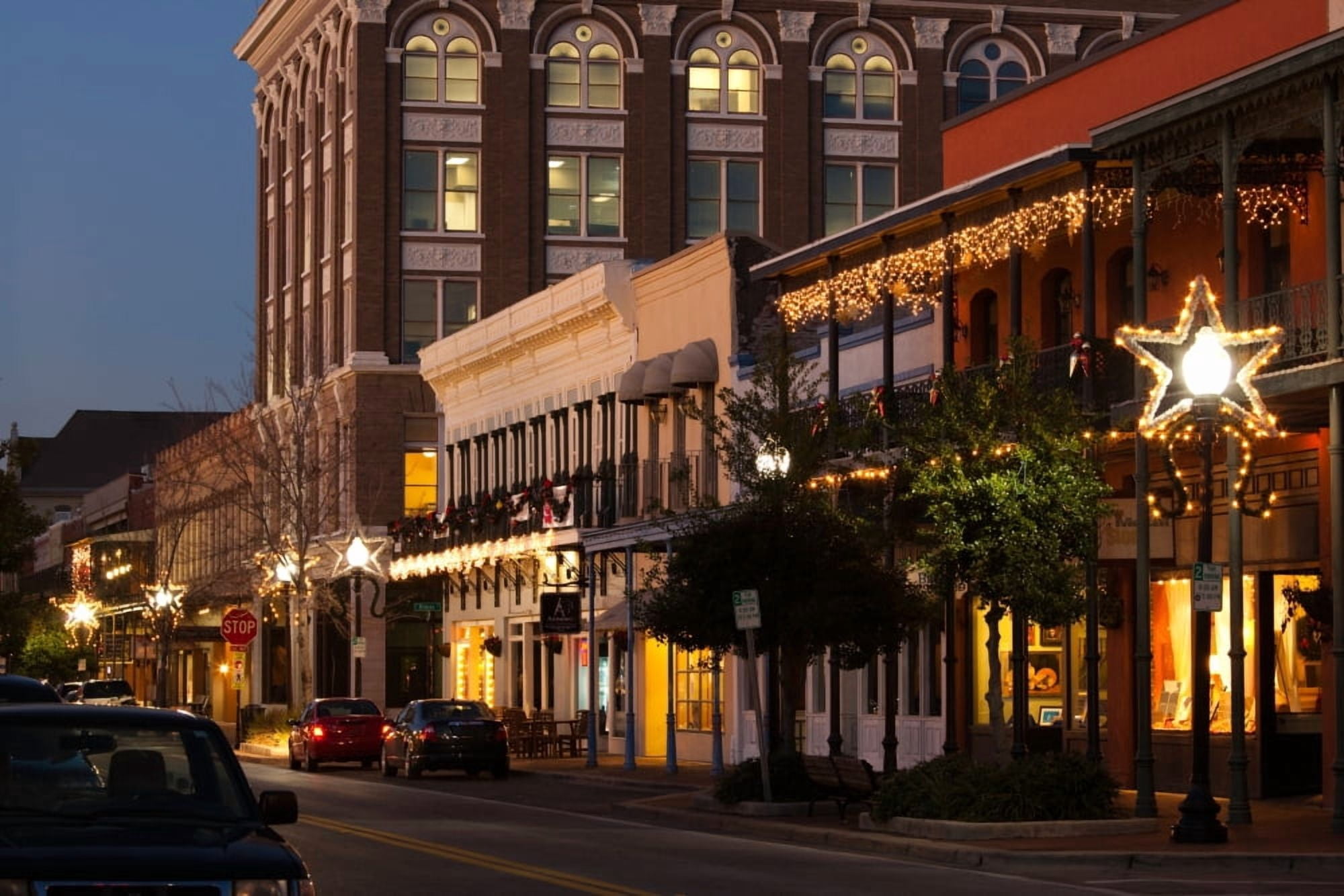 Buildings lit up at dusk Palafox Street Pensacola Escambia County Florida Panhandle Florida USA Canvas Art - Panoramic Images (36 x 12)