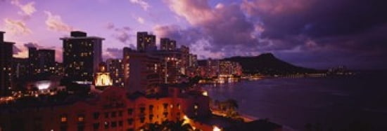 Buildings lit up at dusk Waikiki Oahu Hawaii USA Canvas Art - Panoramic Images (36 x 12)