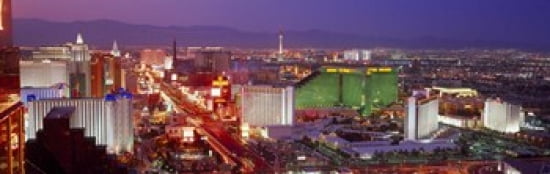 Buildings lit up at dusk in a city Las Vegas Clark County Nevada USA Canvas Art - Panoramic Images (36 x 12)