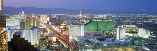 Buildings lit up at dusk in a city Las Vegas Clark County Nevada USA Canvas Art - Panoramic Images (36 x 12)