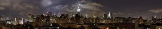 Buildings lit up at night Empire State Building Manhattan New York City New York State USA 2009 Canvas Art - Panoramic Images (44 x 8)