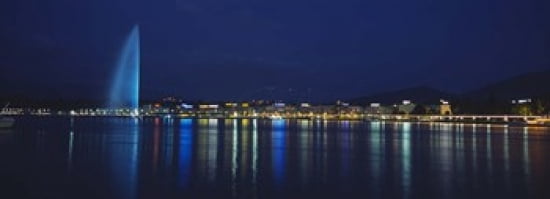 Buildings lit up at night Jet Deau Lake Geneva Lausanne Switzerland Canvas Art - Panoramic Images (36 x 13)
