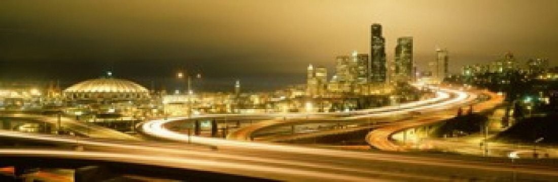 Buildings lit up at night Seattle Washington State USA Canvas Art - Panoramic Images (18 x 6)