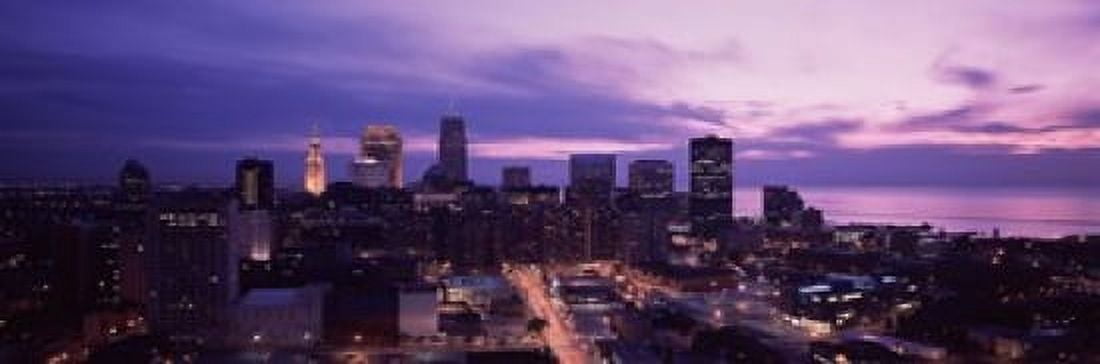 Buildings lit up at night in a city Cleveland Cuyahoga County Ohio USA Canvas Art - Panoramic Images (18 x 6)