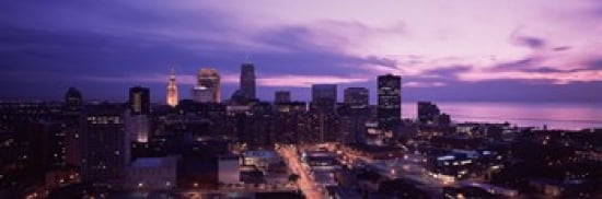 Buildings lit up at night in a city Cleveland Cuyahoga County Ohio USA Canvas Art - Panoramic Images (36 x 12)