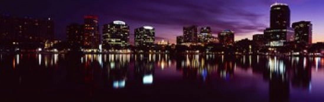 Buildings lit up at night in a city Lake Eola Orlando Orange County Florida USA 2010 Canvas Art - Panoramic Images (18 x 6)