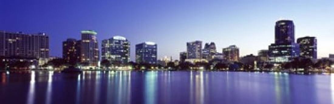 Buildings lit up at night in a city Lake Eola Orlando Orange County Florida USA 2010 Canvas Art - Panoramic Images (18 x 6)