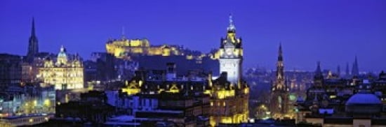 Buildings lit up at night with a castle in the background Edinburgh Castle Edinburgh Scotland Canvas Art - Panoramic Images (36 x 12)