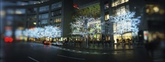 Buildings lit up at the roadside Columbus Circle New York City New York State USA Canvas Art - Panoramic Images (30 x 12)