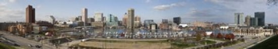 Buildings near a harbor Inner Harbor Baltimore Maryland USA 2009 Canvas Art - Panoramic Images (44 x 8)