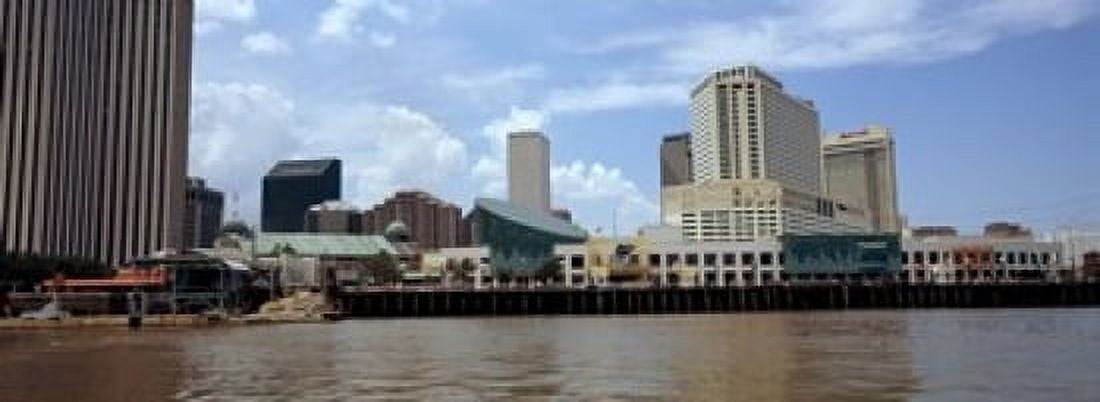 Buildings viewed from the deck of a ferry New Orleans Louisiana USA Canvas Art - Panoramic Images (18 x 7)