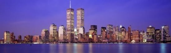 Buildings at the waterfront lit up at dusk World Trade Center Wall Street Manhattan New York City New York State USA Canvas Art - Panoramic Images (36 x 12)