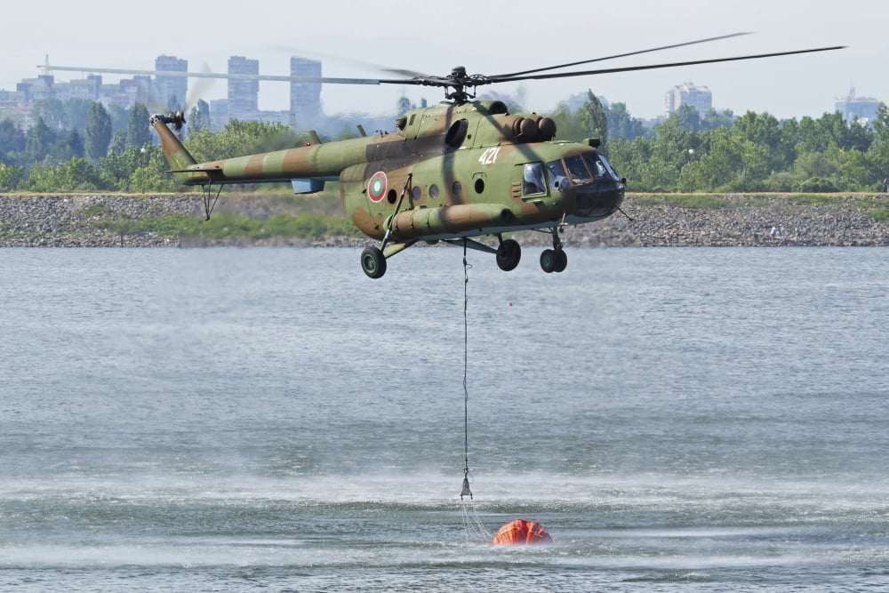 Bulgarian Air Force Mi-17 taking water with Bambi Bucket Canvas Art - Anton BalakchievStocktrek Images (18 x 12)