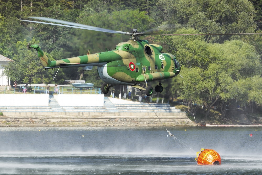 Bulgarian Air Force Mi-17 taking water with Bambi Bucket Canvas Art - Anton BalakchievStocktrek Images (35 x 24)