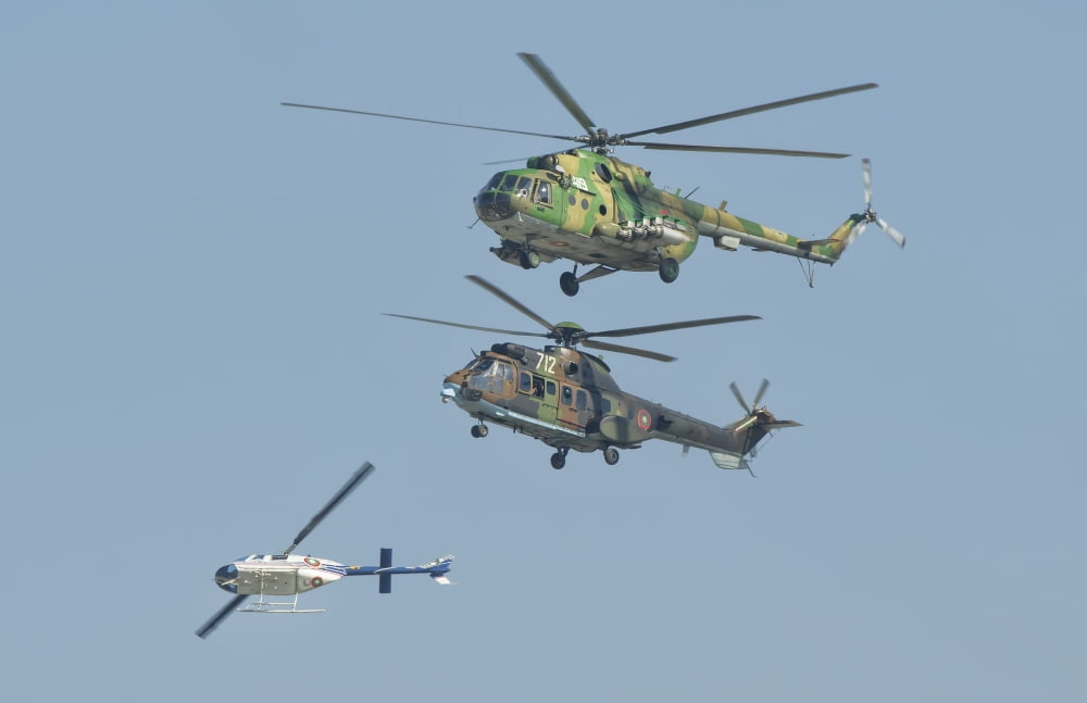 Bulgarian Air Force helicopters flying over Bulgaria Canvas Art - Giovanni CollaStocktrek Images (18 x 12)