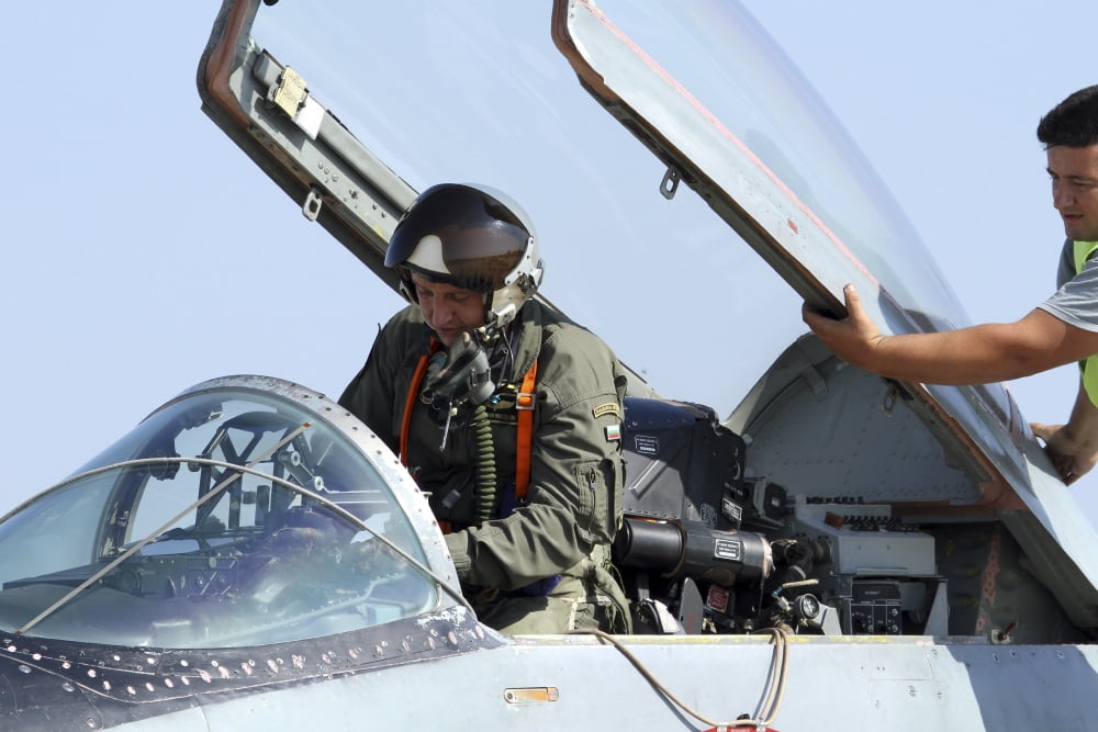 Bulgarian Air Force pilot in the cockpit of an MiG-29 jet Canvas Art - Anton BalakchievStocktrek Images (35 x 23)