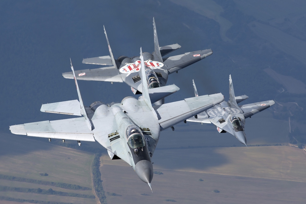 Bulgarian and Polish Air Force MiG-29s aircraft flying over Bulgaria Canvas Art - Daniele FaccioliStocktrek Images (17 x 12)