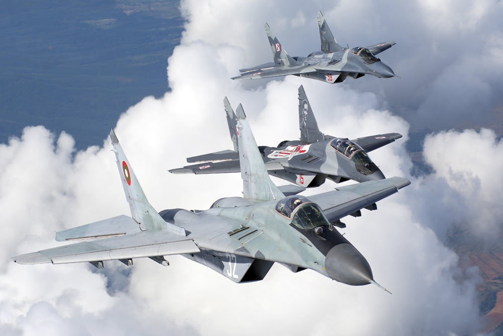 Bulgarian and Polish Air Force MiG-29s aircraft flying over Bulgaria Canvas Art - Daniele FaccioliStocktrek Images (17 x 12)