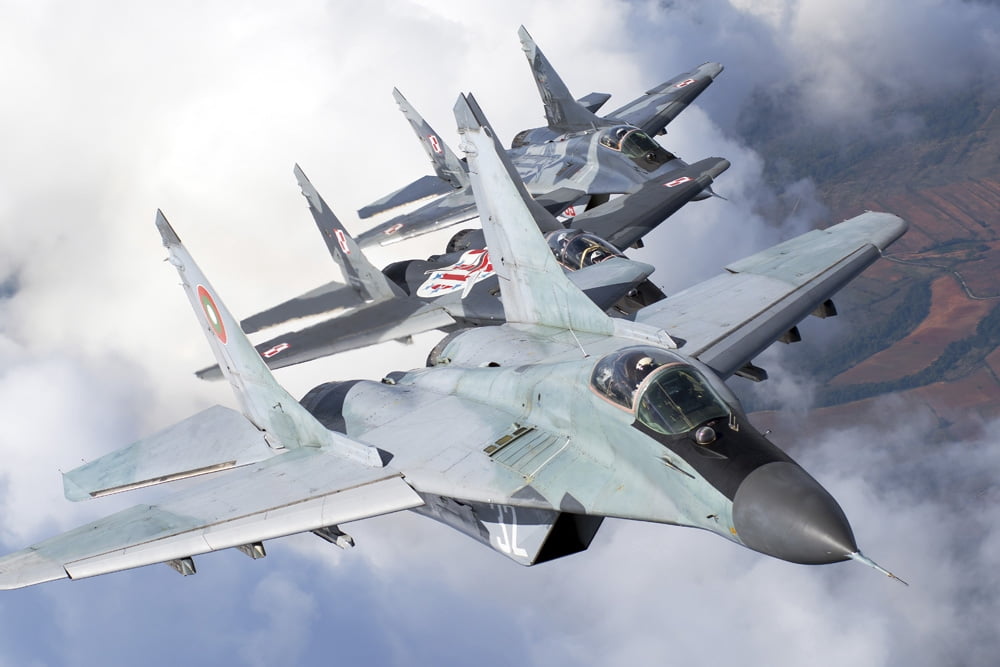 Bulgarian and Polish Air Force MiG-29s aircraft flying over Bulgaria Canvas Art - Daniele FaccioliStocktrek Images (17 x 12)