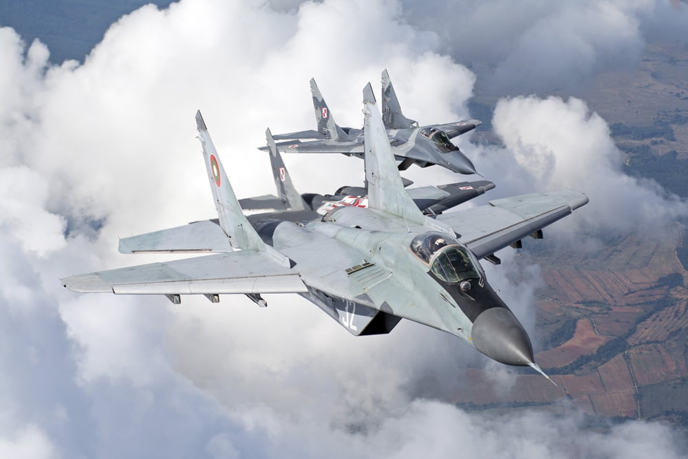 Bulgarian and Polish Air Force MiG-29s planes flying over Bulgaria Canvas Art - Daniele FaccioliStocktrek Images (17 x 12)