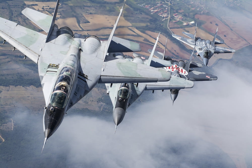 Bulgarian and Polish Air Force MiG-29s planes flying over Bulgaria Canvas Art - Daniele FaccioliStocktrek Images (17 x 12)