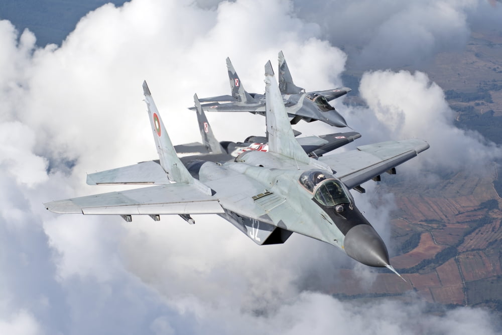 Bulgarian and Polish Air Force MiG-29s planes flying over Bulgaria Canvas Art - Daniele FaccioliStocktrek Images (34 x 23)