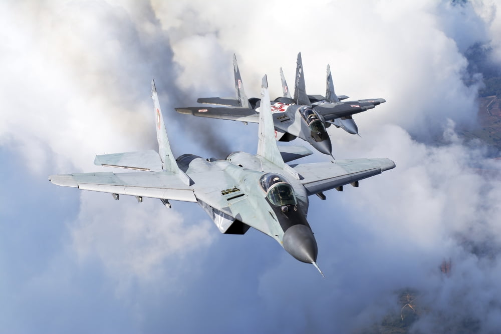 Bulgarian and Polish Air Force MiG-29s planes flying over Bulgaria Canvas Art - Daniele FaccioliStocktrek Images (34 x 23)