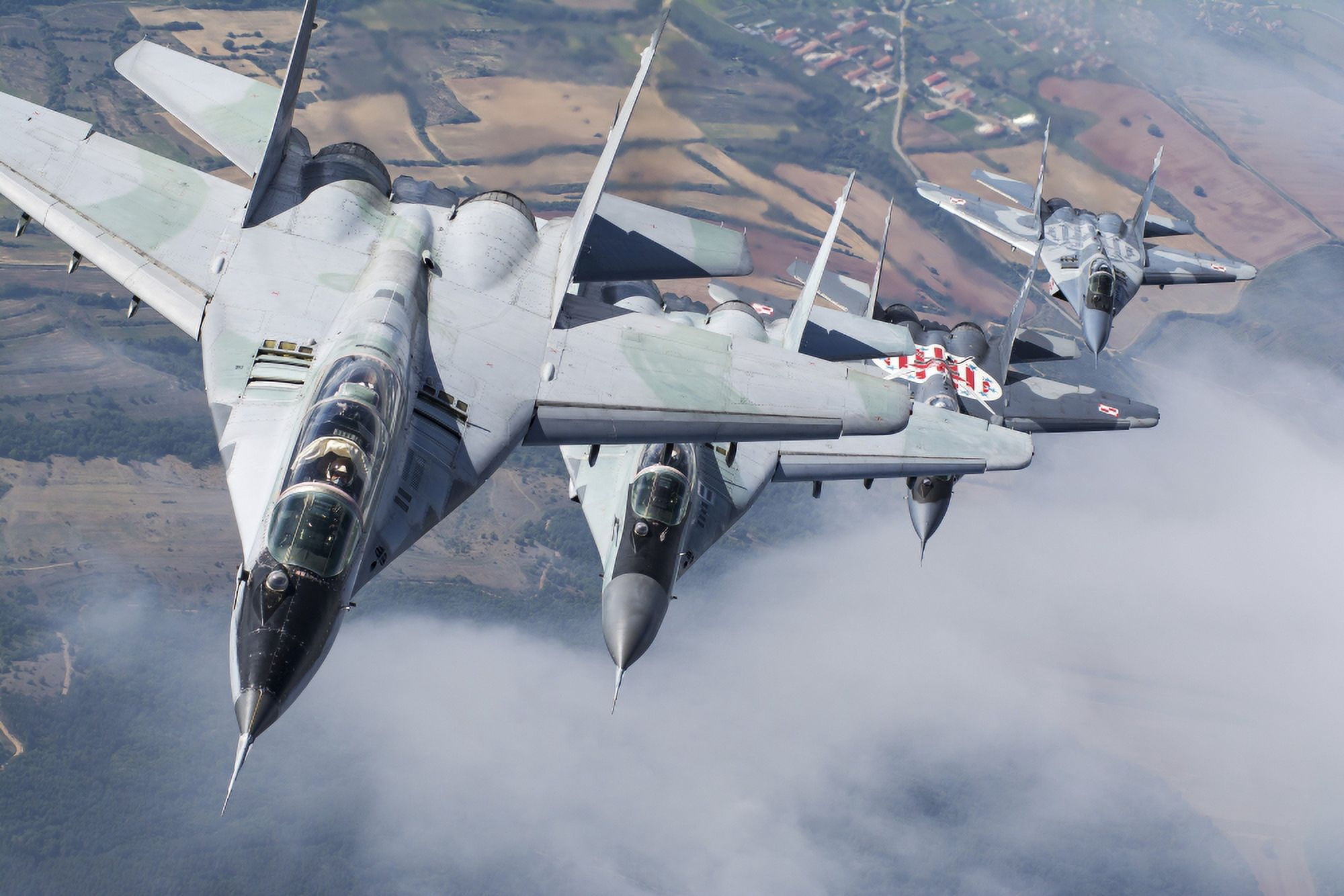 Bulgarian and Polish Air Force MiG-29s planes flying over Bulgaria Canvas Art - Daniele FaccioliStocktrek Images (34 x 23)