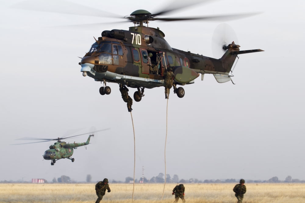 Bulgarian special forces fast-roping from a Eurocopter AS532 Cougar Canvas Art - Anton BalakchievStocktrek Images (35 x 23)