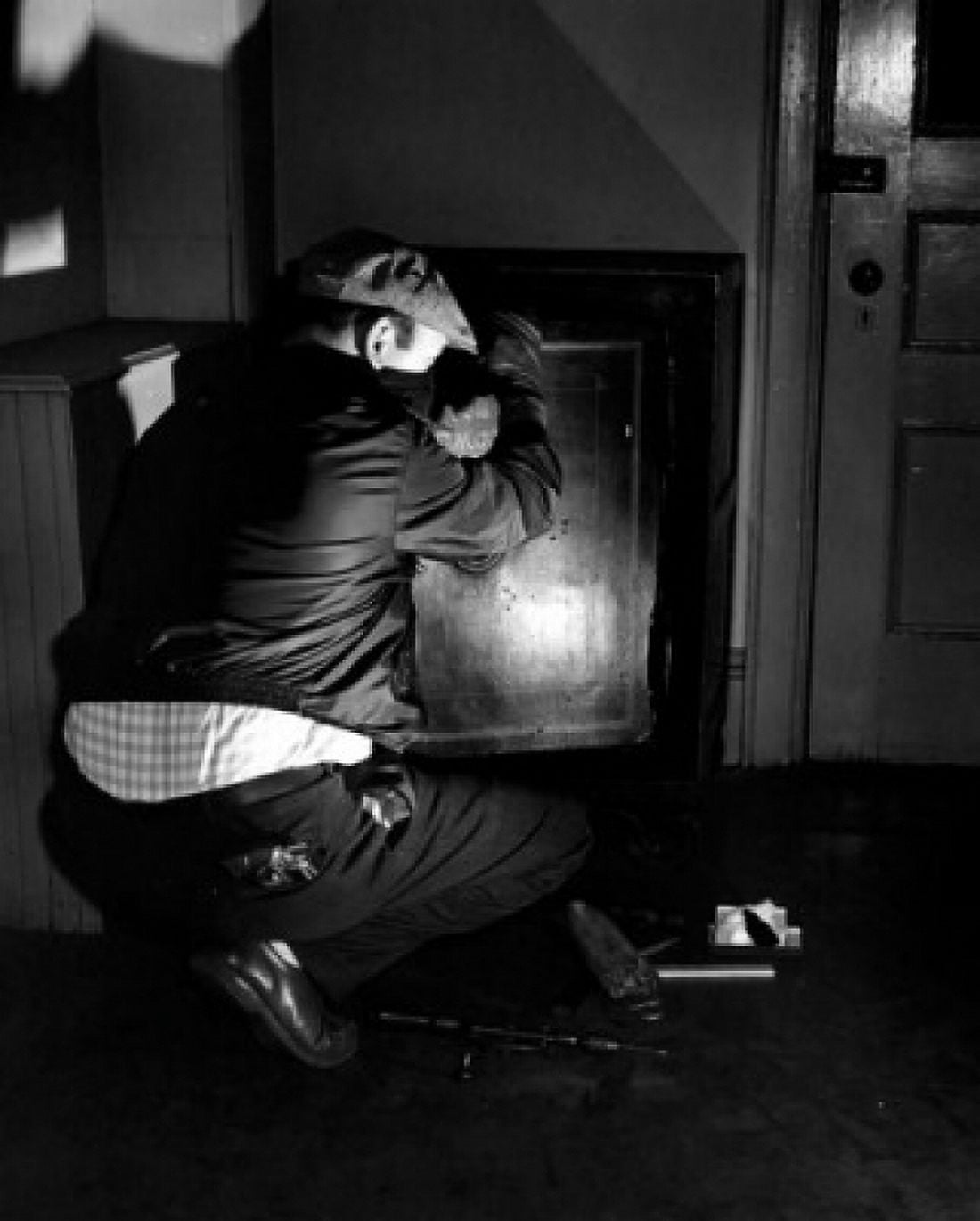 Burglar opening safe Canvas Art -  (24 x 36)