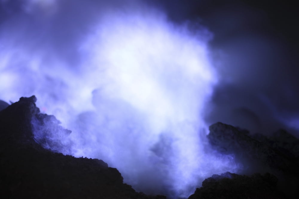 Burning sulphur on Kawah Ijen Volcano Java Indonesia Canvas Art - Richard RoscoeStocktrek Images (35 x 23)