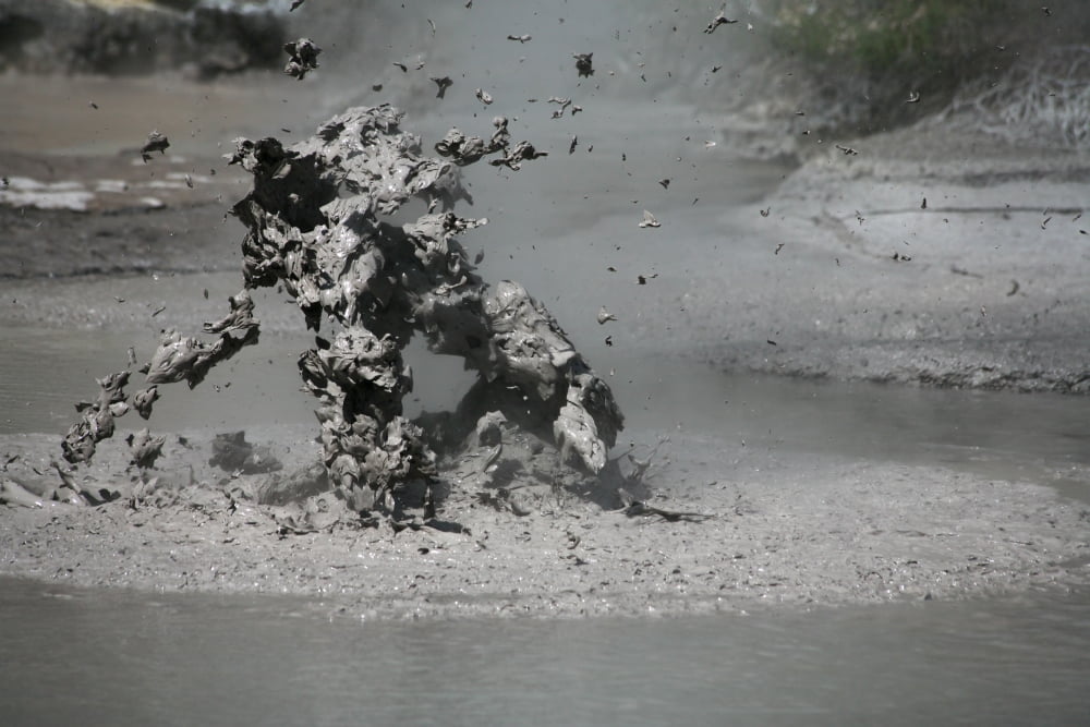 Bursting mud bubble Wai-O-Tapu Geothermal area Taupo Volcanic Zone New Zealand Canvas Art - Richard RoscoeStocktrek Images (18 x 12)