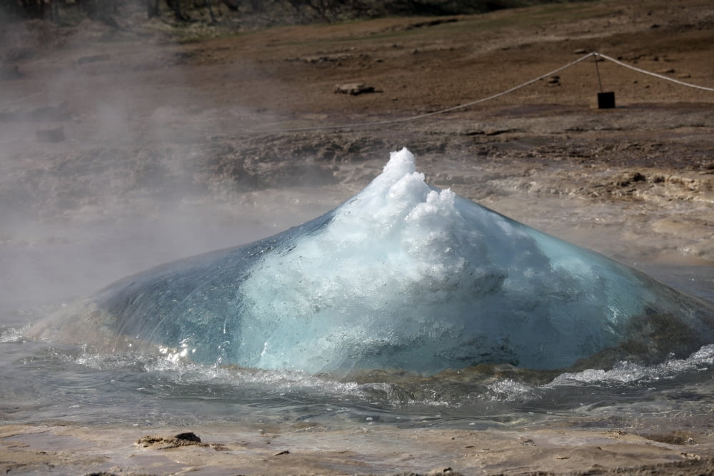 Bursting water bubble at onset of eruption of Strokkur Geysir Iceland Canvas Art - Richard RoscoeStocktrek Images (35 x 23)