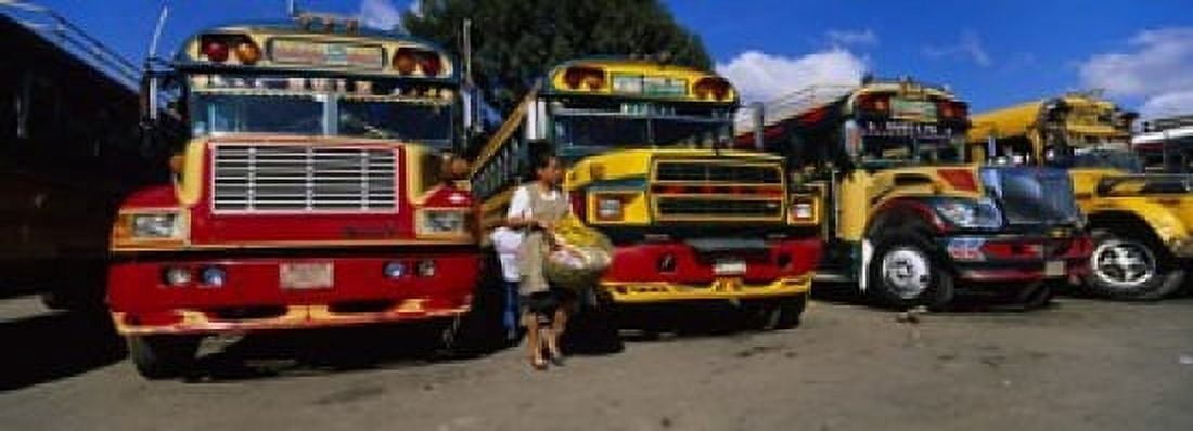 Buses Parked In A Row At A Bus Station Antigua Guatemala Canvas Art - Panoramic Images (18 x 7)