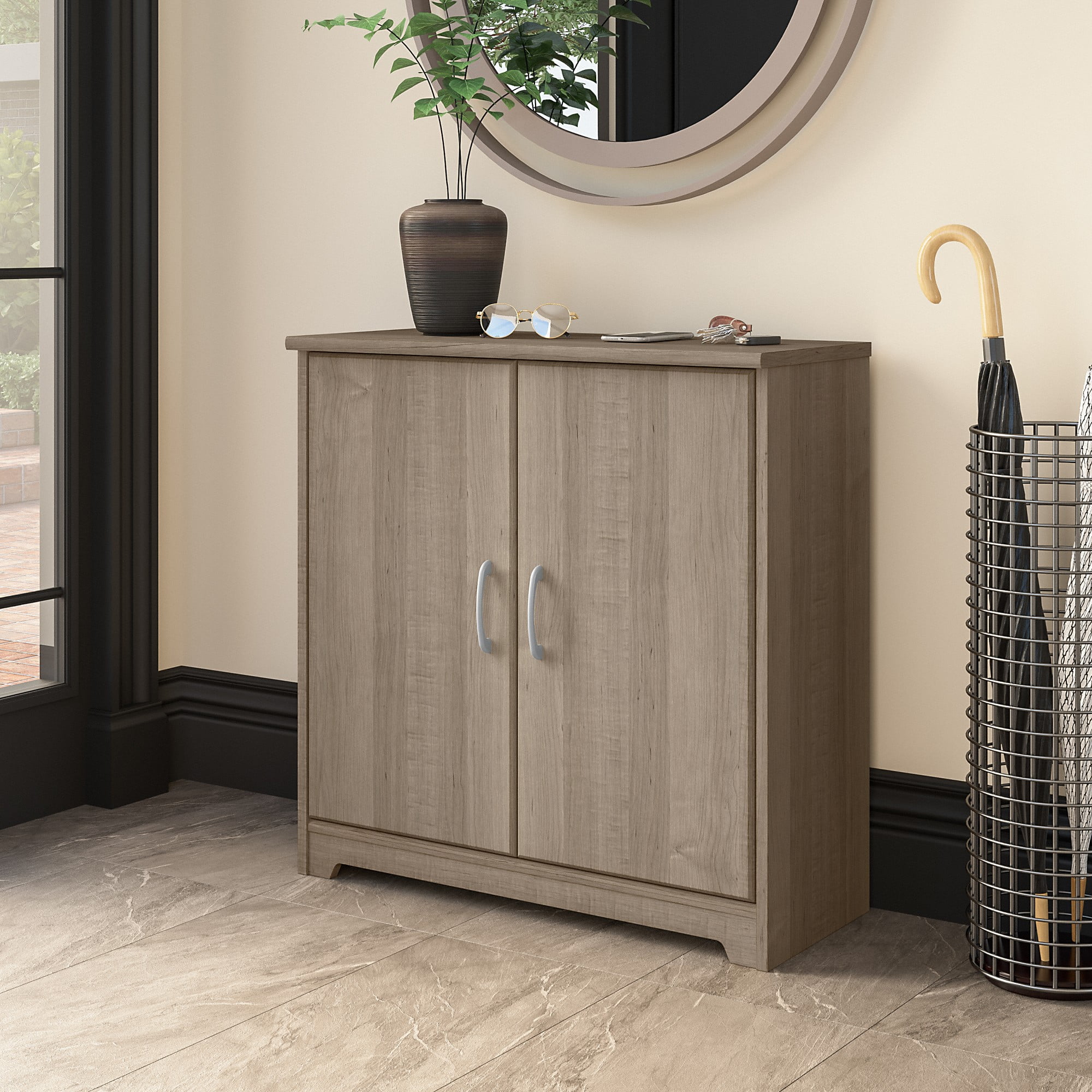 https://i5.walmartimages.com/seo/Bush-Furniture-Cabot-Small-Entryway-Cabinet-with-Doors-in-Ash-Gray_efd04c77-65cf-48f3-9cef-6d76979124c0.f696ca59859e3259b2eaa790541febe2.jpeg